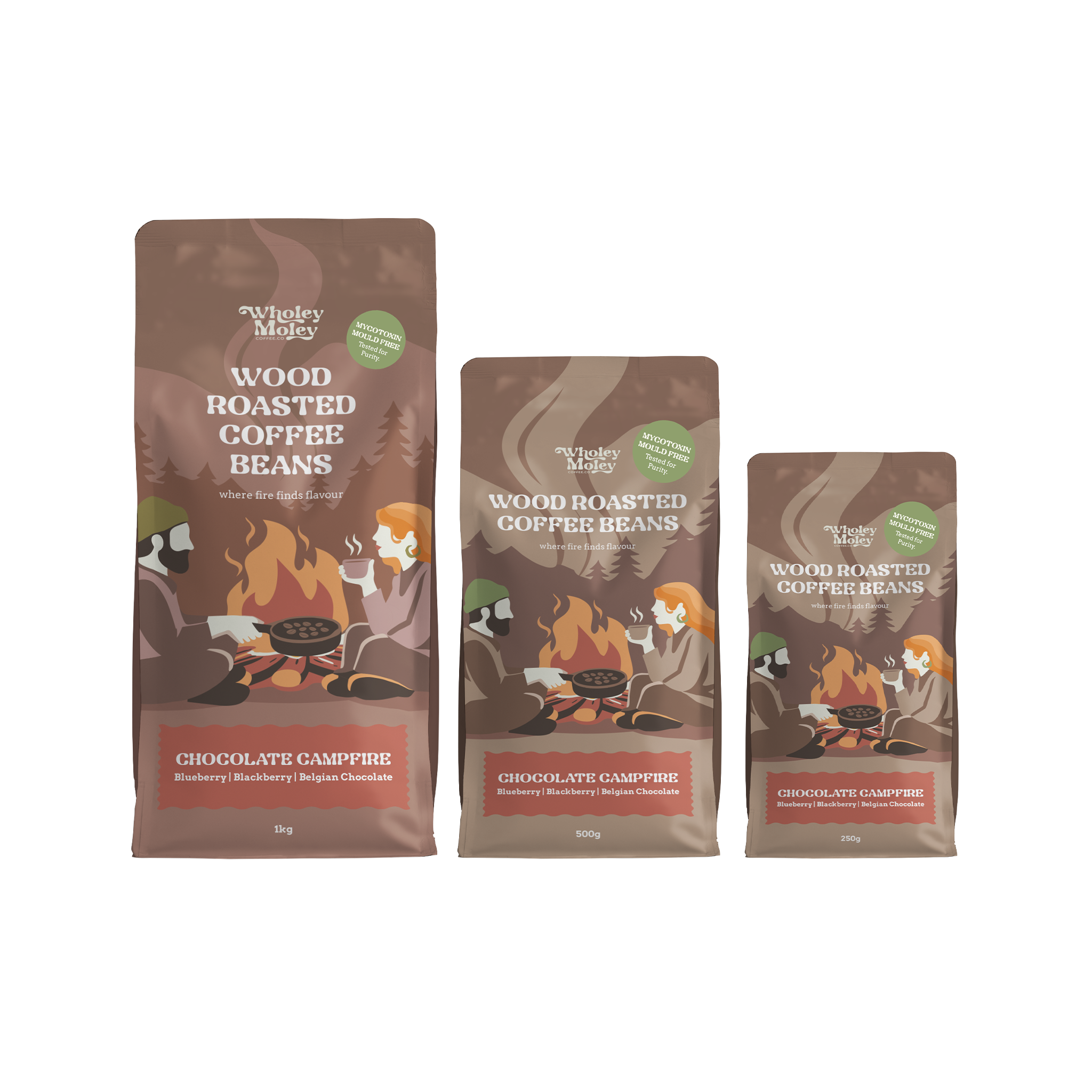 Three bags of Wholey Moley Wood Roasted Coffee Beans in different sizes, featuring a brown and orange campfire illustration on a white background.