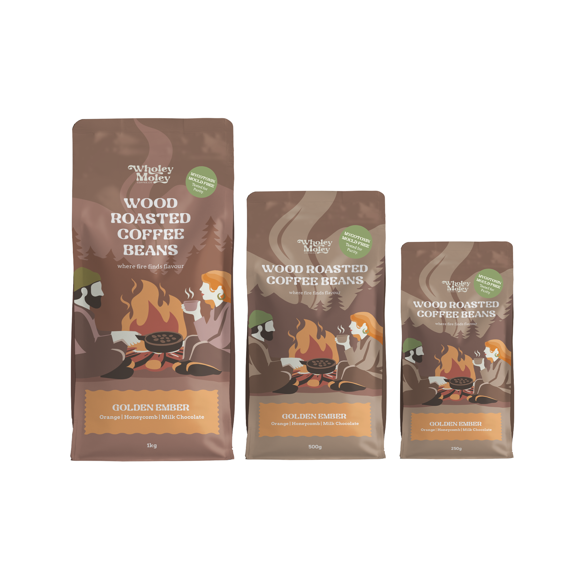 Three bags of Wholey Moley Wood Roasted Coffee Beans in different sizes: The bags are brown with illustrations of campers around campfires and a green circular badge.