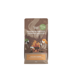 A 250g bag of Wholey Moley Wood Roasted Coffee Beans in the Golden Ember flavor, featuring a brown packaging design with an illustration of two people camping by a fire.